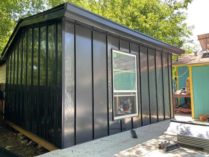 Black standing seam metal wall panels for Metal Roof Installation in Middlesex